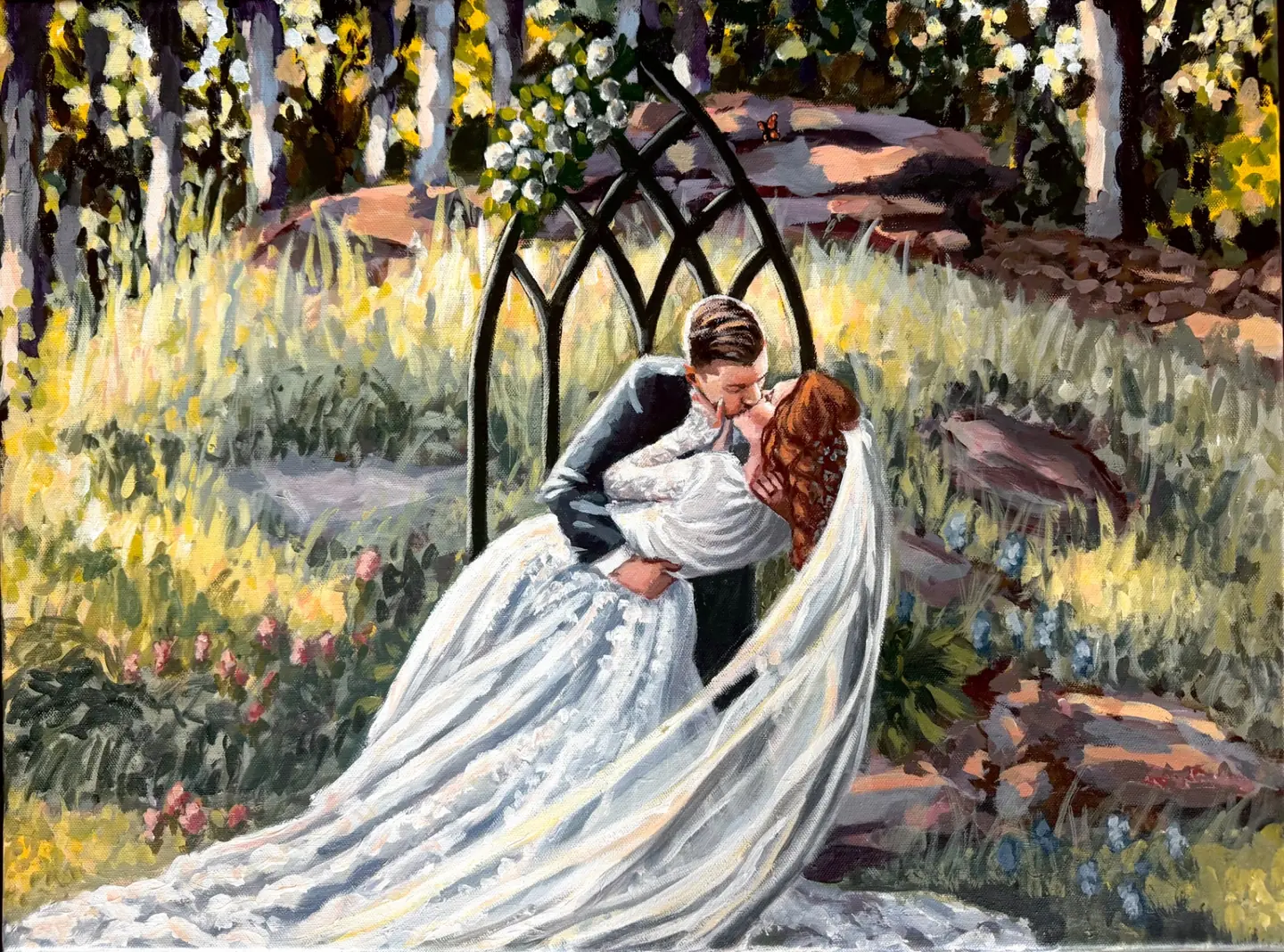 Live wedding painting of bride and groom kissing beneath a black garden arch in a golden meadow — Oklahoma wedding artist